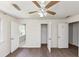 Bedroom featuring new flooring, natural light, and a ceiling fan at 2767 Kathie Ln, Ellenwood, GA 30294