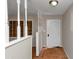 Entryway featuring white walls, stairs, and a light fixture at 2767 Kathie Ln, Ellenwood, GA 30294