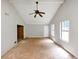 Bright living room with vaulted ceiling, ceiling fan, and natural light at 2767 Kathie Ln, Ellenwood, GA 30294
