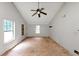 A bright living room featuring a ceiling fan and natural lighting at 2767 Kathie Ln, Ellenwood, GA 30294