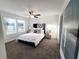 Bright bedroom with ample natural light, ceiling fan, and a comfortable bed at 3341 Sable Elm Ct, Atlanta, GA 30349