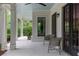 Cozy covered porch with comfortable seating, stylish lanterns, and serene outdoor ambiance at 357 Mell Ave # A, Atlanta, GA 30307