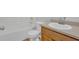 Bathroom with a white tub, toilet, and wood vanity with sink at 3946 Village Crossing Ln, Ellenwood, GA 30294