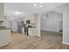 Open concept kitchen with stainless steel appliances at 3946 Village Crossing Ln, Ellenwood, GA 30294