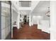 Bright entryway with hardwood floors, high ceilings, and an open view into the dining and living area at 4435 Manor Creek Dr, Cumming, GA 30040