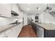 Spacious kitchen featuring a kitchen island and stainless steel appliances at 4435 Manor Creek Dr, Cumming, GA 30040