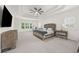 Spacious main bedroom with trey ceiling, ceiling fan, large windows with shutters, and dresser at 4435 Manor Creek Dr, Cumming, GA 30040
