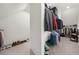 Spacious walk-in closet with rows of storage for clothing and shoes at 4435 Manor Creek Dr, Cumming, GA 30040
