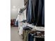 Bright walk-in closet with custom shelving and hanging rods at 4435 Manor Creek Dr, Cumming, GA 30040