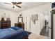 Cozy bedroom showcases stylish decor and convenient access to the hallway at 6861 Louis Dr, Locust Grove, GA 30248