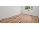 Bedroom with hardwood flooring, large window, and white walls at 863 N Bay Overlook, Villa Rica, GA 30180