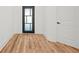 Cozy bedroom featuring light wood floors, fresh white walls, and natural light at 863 N Bay Overlook, Villa Rica, GA 30180