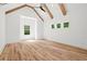 Bright bedroom with vaulted ceilings, wood beams, and hardwood floors at 863 N Bay Overlook, Villa Rica, GA 30180