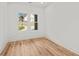 Bright bedroom features light wood floors, fresh white walls, and natural light streaming through the windows at 863 N Bay Overlook, Villa Rica, GA 30180