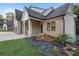 Charming brick home with a well-manicured lawn, stylish landscaping, and inviting entrance at 863 N Bay Overlook, Villa Rica, GA 30180