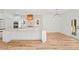 Bright kitchen features a central island with barstool seating at 863 N Bay Overlook, Villa Rica, GA 30180
