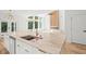 Bright open kitchen with a large center island, marble countertops, and modern fixtures at 863 N Bay Overlook, Villa Rica, GA 30180
