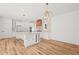 Open kitchen featuring a large center island, custom cabinetry, and stainless steel appliances at 863 N Bay Overlook, Villa Rica, GA 30180