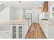 Modern kitchen featuring white cabinets, stainless steel appliances, and a large island at 863 N Bay Overlook, Villa Rica, GA 30180