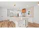 Bright, modern kitchen with white cabinets, a large island, and stainless steel appliances at 863 N Bay Overlook, Villa Rica, GA 30180