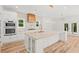 Bright, open kitchen with a large center island, custom cabinetry, and modern stainless steel appliances at 863 N Bay Overlook, Villa Rica, GA 30180