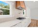 Kitchen featuring stainless steel appliances, custom range hood, and bright natural light at 863 N Bay Overlook, Villa Rica, GA 30180