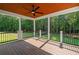 Covered outdoor patio featuring tongue-and-groove ceiling and a view of the backyard at 863 N Bay Overlook, Villa Rica, GA 30180