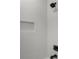 Modern shower with a sleek wave tile pattern and black hardware at 863 N Bay Overlook, Villa Rica, GA 30180