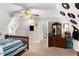 Comfortable bedroom with ample natural light and a ceiling fan, great for a relaxing retreat at 1112 Sutton Dr, Mcdonough, GA 30252