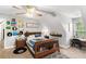 Comfortable bedroom with ample natural light and a ceiling fan, great for a relaxing retreat at 1112 Sutton Dr, Mcdonough, GA 30252