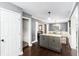 Kitchen view showcasing the island, gray cabinets, and hardwood flooring at 1112 Sutton Dr, Mcdonough, GA 30252