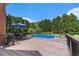Deck area showcasing an above ground pool, surrounded by a wooden deck with outdoor seating at 1112 Sutton Dr, Mcdonough, GA 30252