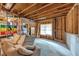 Spacious unfinished basement featuring exposed beams and studs, offering potential for customization at 1245 Smokehouse Trl, Cumming, GA 30041