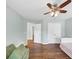 Spacious bedroom with hardwood floors, bright, natural light, and a ceiling fan at 1245 Smokehouse Trl, Cumming, GA 30041