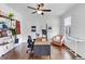 Bright home office with modern desk, stylish decor, and ample natural light from the window at 1245 Smokehouse Trl, Cumming, GA 30041