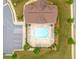 Aerial view of the community pool with lounge chairs and shaded seating areas at 2965 Westlington Cir, Cumming, GA 30040