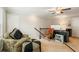 Upstairs bonus room with cozy seating area, computer setup, and plenty of space at 2965 Westlington Cir, Cumming, GA 30040
