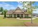 Beautifully landscaped clubhouse with ample parking and a welcoming entrance at 2965 Westlington Cir, Cumming, GA 30040