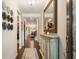 Inviting entryway featuring hardwood floors, light walls, stylish decor and a view into the living spaces at 2965 Westlington Cir, Cumming, GA 30040