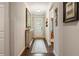 Bright entryway with hardwood floors, light gray walls, and elegant furnishings at 2965 Westlington Cir, Cumming, GA 30040