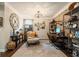 Stylish office with brick wall, unique lighting, and organized shelving at 2965 Westlington Cir, Cumming, GA 30040