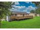 Enjoy outdoor living with this backyard showcasing a spacious wooden deck with ample space at 3233 Glynn Mill Dr, Snellville, GA 30039