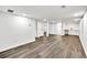 Finished basement with new laminate flooring, recessed lighting, and a convenient bar area at 3233 Glynn Mill Dr, Snellville, GA 30039