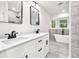 This bathroom features a double sink vanity, soaking tub, and a stand-up shower at 3233 Glynn Mill Dr, Snellville, GA 30039