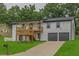 Charming two-story home with a spacious two-car garage and inviting curb appeal at 3233 Glynn Mill Dr, Snellville, GA 30039