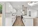 Well-equipped kitchen boasts sleek cabinetry, quartz countertops, and modern stainless steel appliances at 3233 Glynn Mill Dr, Snellville, GA 30039