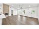 Bright and airy open space featuring hardwood flooring, a modern fireplace, and a large window at 3233 Glynn Mill Dr, Snellville, GA 30039