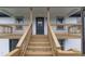 Inviting covered porch features sturdy railings and provides access to the home's entrance at 3233 Glynn Mill Dr, Snellville, GA 30039