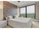 Bedroom with a king size bed and floor to ceiling windows with a nice view at 3344 Peachtree Ne Rd # 3405, Atlanta, GA 30326