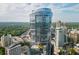 Stunning high-rise building with a modern glass facade and city views at 3344 Peachtree Ne Rd # 3405, Atlanta, GA 30326
